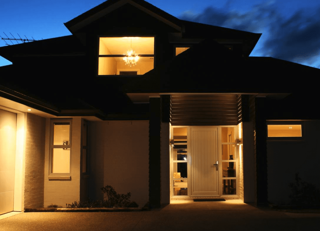 House lit up at night